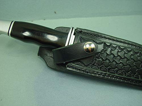 Custom knife sheath for the buck 120 knife. The sheath is made out of 10 ounce water buffalo hide leather. The water buffalo leather is soft pliable and durable. The sheath is a right hand carry with a belt loop that will take up to a 3 inch belt. The she