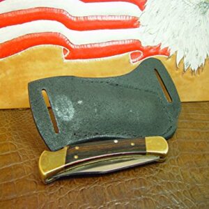 Buck Custom Left Hand Cross Draw Knife Sheath for a 110 Knife. The Sheath is Made Out of Buffalo Hide Leather Hand Tooled with a Basket Weave Pattern.