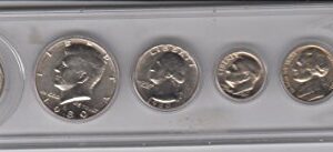 1980 Birth Year Coin Set (6) Coins Dollar, half Dollar, Quarter, Dime, Nickel, and Cent - all dated 1980 and Encased in a Plastic Display Holder Uncirculated