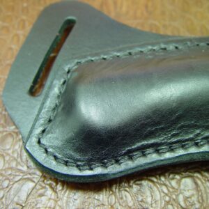 Custom Left Hand Cross Draw Knife Sheath for a Buck 110 Knife. The Sheath is Made Out of Buffalo Hide Leather Dyed Black.