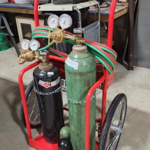 Red Steel Welding Cart Hauls Welding Tanks Torch Equipment Over Rough Terrain