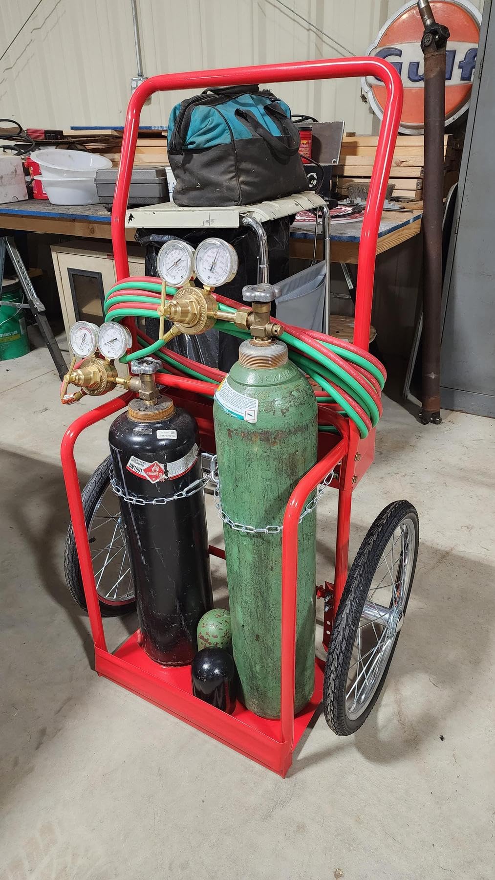 Red Steel Welding Cart Hauls Welding Tanks Torch Equipment Over Rough Terrain