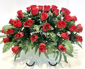 cemetery flowers for grave decoration with red rose buds and baby's breath made into a saddle arrangement for headstones