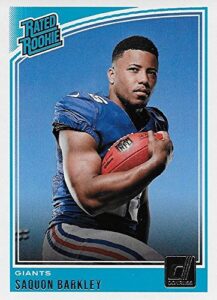 saquon barkley 2018 donruss short printed mint rated rookie card #306 picturing this #2 nfl draft pick in his blue new york giants jersey