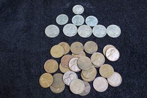 pds american classics coin bag. a total of 34 coins -- 5 full date buffalo nickels, 25 unsearched wheat pennies, 3 steel cents, and a silver mercury dime - - the american coins collection. 1c, 5, 10c seller circulated condition to fine