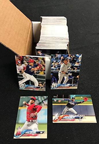 2018 Topps Update Complete Baseball Set of 300 Cards Includes Rookies and Traded Cards. Overall Condition is NM-MT. Includes rookie cards of Ohtani (3 Total Cards), Gleyber Torres (3 Total Cards), Acuna Jr. (3 Total Cards), and updated cards of Giancarlo