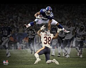 saquon barkley new york giants hurdle unsigned photograph - nfl unsigned miscellaneous