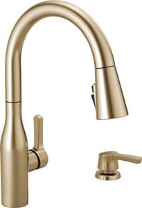 delta marca single-handle pull-down sprayer kitchen faucet with shieldspray technology in champagne bronze