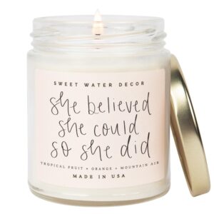 sweet water decor, she believed she could so she did, tropical fruit, orange, mountain air, and island scented soy wax candle for home | 9oz clear jar, 40 hour burn time, made in the usa