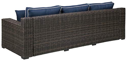 Signature Design by Ashley Grasson Lane Outdoor Patio Wicker Sofa with Cushion and 2 Pillows, Brown & Blue