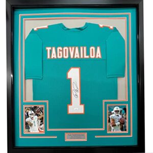 framed autographed/signed tua tagovailoa 33x42 miami teal football jersey beckett bas coa