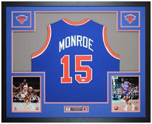 earl monroe autographed blue new york knicks jersey - beautifully matted and framed - hand signed by monroe and certified authentic by jsa - includes certificate of authenticity