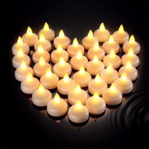 honoson 36 pieces valentine's day flameless floating candles waterproof led tea lights warm white battery flickering water activated floating candles for wedding party pool decorations(yellow light)