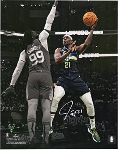 jrue holiday milwaukee bucks autographed 11" x 14" 2021 nba finals champion spotlight photograph - autographed nba photos