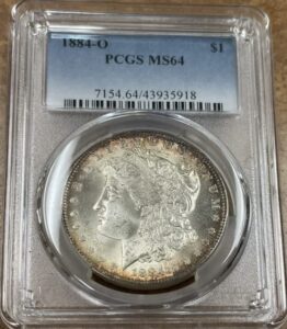 1884 o morgan silver dollar, bright, reddish bronze rim toning $1 pcgs ms-64