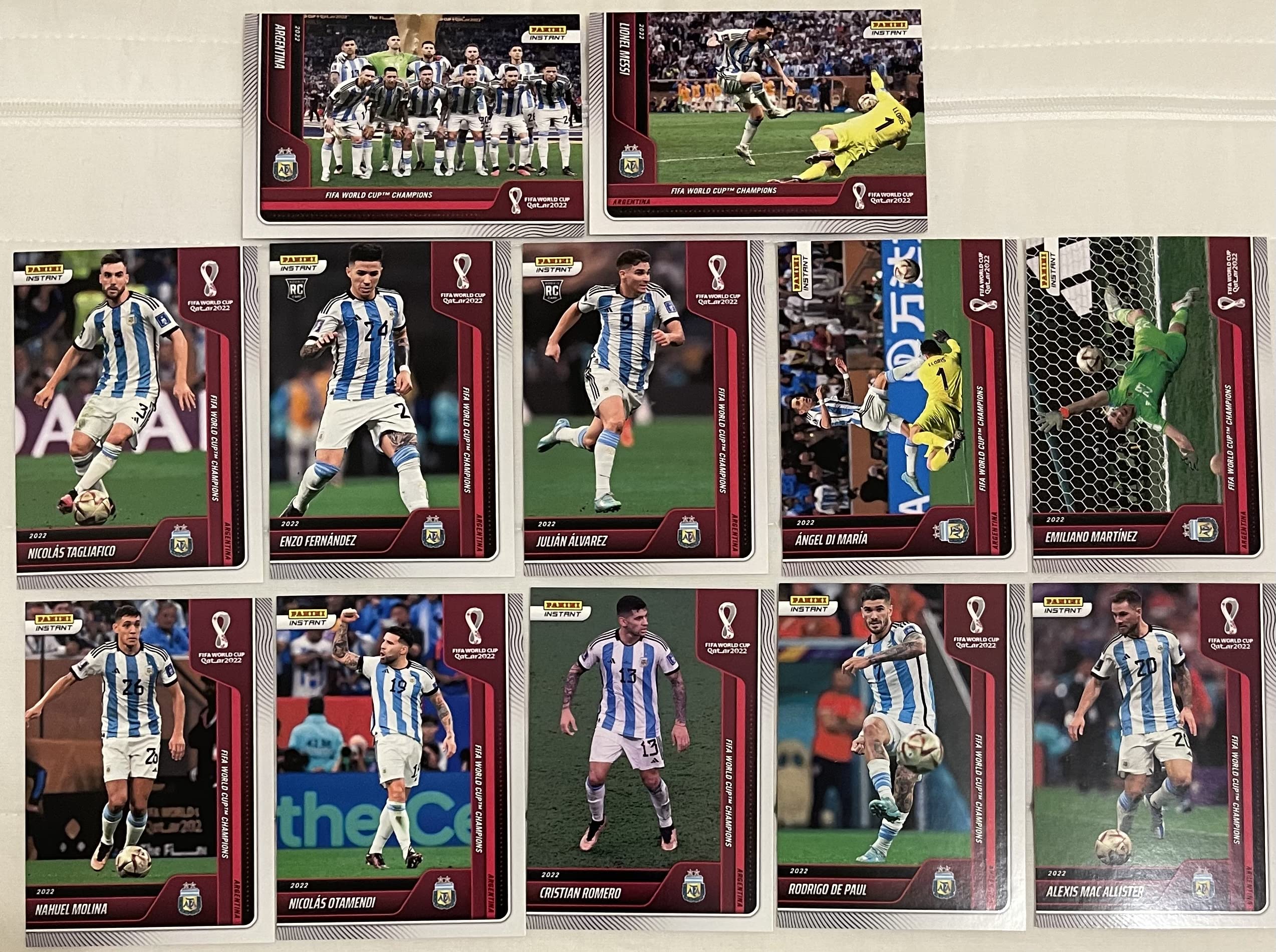 2022 Panini Instant World Cup Champions Argentina Team Set -12 Total Cards including Lionel Messi, Julian Alvarez RC, Angel Di Maria, Alexis Mac Allister, Rodrigo De Paul, Enzo Fernandez RC, Nahuel Molina, Nicolas Otamendi, Cristian Romero, Nicolas Taglia