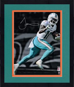 framed tyreek hill miami dolphins autographed 11" x 14" peace sign spotlight photograph - limited edition of 110 - autographed nfl photos