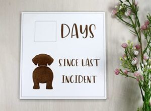funny whiteboard sign, days since last incident (dog)