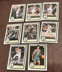 2022-23 panini nba hoops milwaukee bucks team set includes rookies (hand collated) of 8 cards: #44 giannis antetokounmpo #45 khris middleton #46 jrue holiday #47 grayson allen #48 bobby portis #49 pat connaughton #50 george hill #254 marjon beauchamp