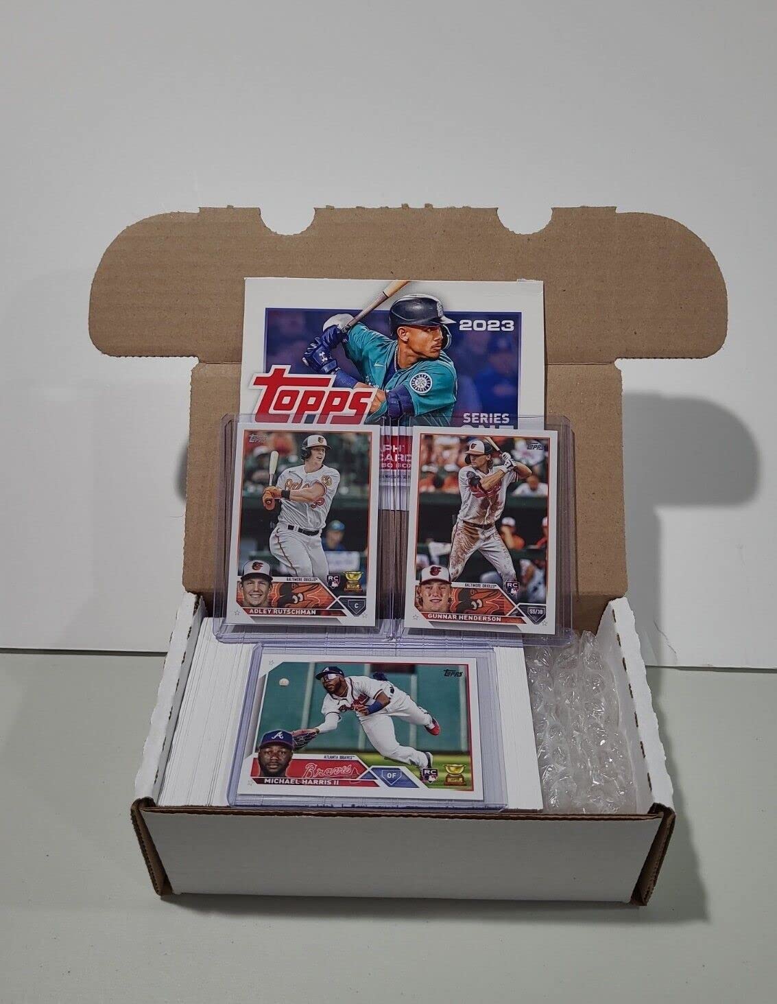 2023 Topps Complete Series One Baseball Set 1-330 - Included in this set are over 50 Rookie Cards. Along with reigning Rookie of the Year winners, Adley Rutschman and Michael Harris, it includes phenoms such as Nolan Gorman, Vaughn Grissom, Gunnar Henders