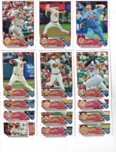 st. louis cardinals / 2023 topps baseball team set (series 1 and 2) with (24) cards ***plus bonus cards of former cardinals greats: ozzie smith, stan musial and willie mcgee!***