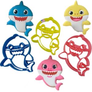 inspired by baby shark cookie cutters. baby, mommy and daddy shark family cartoon characters cookie cutters in a convenient bundle (3 pack)