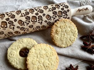 sugar skull and roses embossed rolling pin for halloween cookies. laser engraved dough roller for embossing homemade cookies by algis crafts