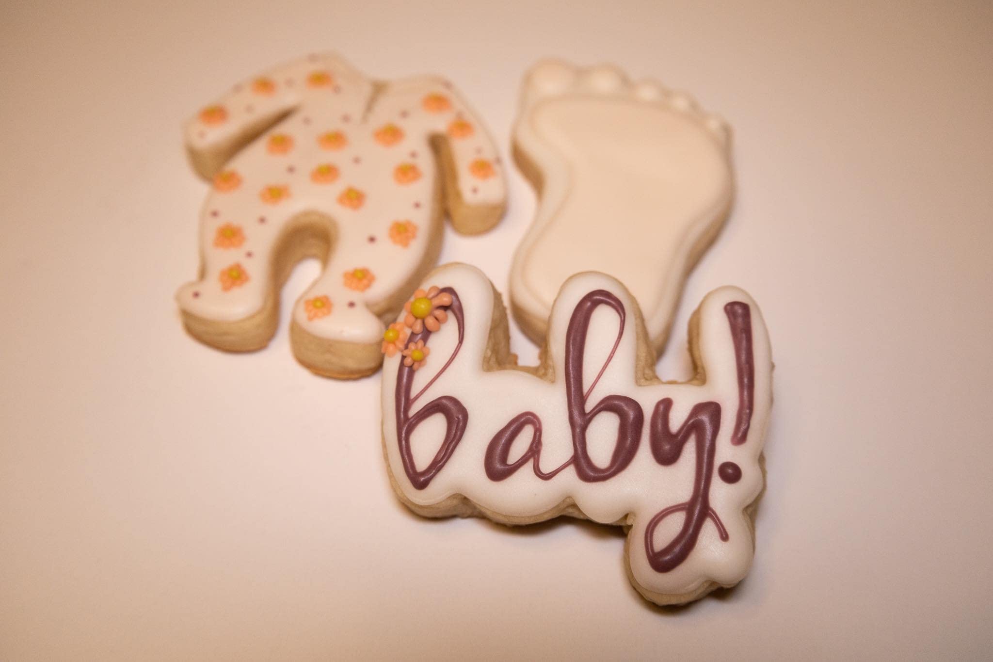 BABY SHOWER SPRINKLE COOKIE CUTTERS Baby Welcome Home Special Occasion Celebration Footie Pajamas With Cursive Word Handwriting And Infant Footprint Cookie Cutters (3 pack)