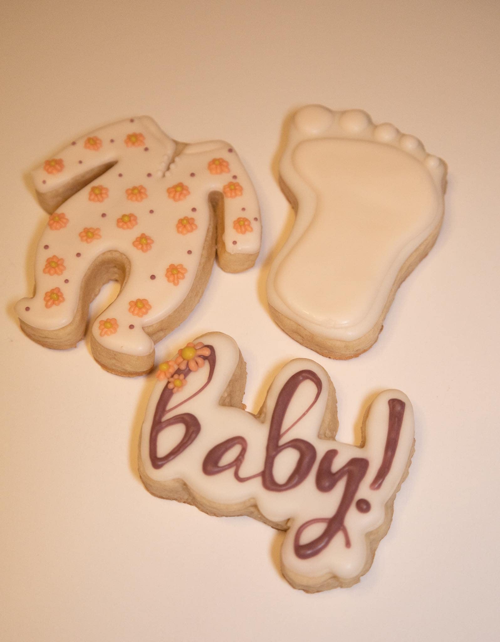 BABY SHOWER SPRINKLE COOKIE CUTTERS Baby Welcome Home Special Occasion Celebration Footie Pajamas With Cursive Word Handwriting And Infant Footprint Cookie Cutters (3 pack)