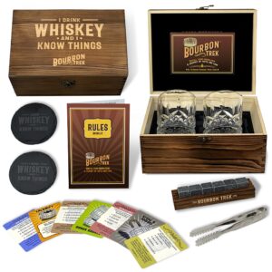 boxed set of whiskey gifts for men - includes popular whiskey trivia, 2 bourbon glasses, 6 stones, 2 slate coasters, 1 wooden freezer tray & stainless steel tongs - all in 1 premium giftable box
