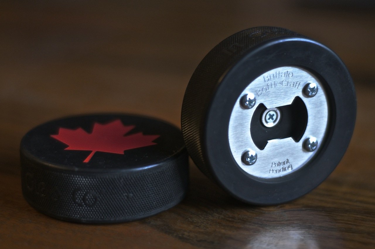 Canadian Maple Leaf Bottle Opener, Made from a real Hockey Puck