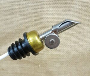 set of 2 stainless steel / gold weighted olive oil pourer with flap w/signature picks