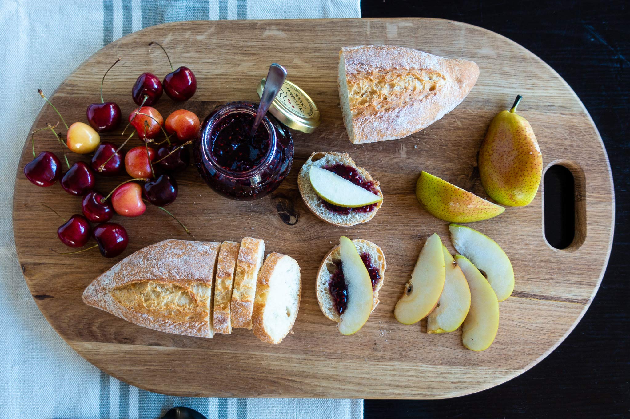 LUX American Oak Wood Oversized Serving Board 20.5" x 13" | Extra Large Charcuterie Board | Cheese Board With Handle for Serving Cheeses, Meats, Crackers, and Wine | Unique Gift (Oval Cutting Board)