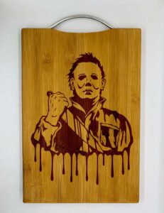 pop culture engraved cutting boards - custom chopping block with metal handle for kitchen - bamboo wood with laser-engraved design - wedding, anniversary - 12"x9"x0.67" (michael horror myers)