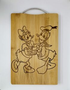 cartoon engraved cutting boards - custom chopping block with metal handle for kitchen - bamboo wood with laser-engraved design - wedding, anniversary - 12"x9"x0.67" (duck couple donald)