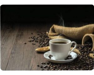 tempered glass cutting board hot coffee in a white coffee cup and many coffee beans placed around tableware kitchen decorative cutting board with non-slip legs, serving board, large size, 15" x 11"
