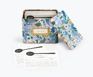 rifle paper co. garden party blue recipe tin, gold metallic interior, gold-framed label on front, includes 24 recipe cards and 12 recipe dividers, bring charm and cheer into your kitchen