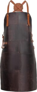 theodore top grain leather apron - 32.5” h x 24.5” w with adjustable crossback leather straps. our leather apron for men has 2 large pockets and a towel strap. grill apron is flame & heat resistant