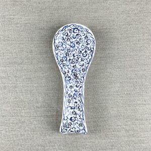 hand painted ceramic spoon rest with floral motifs