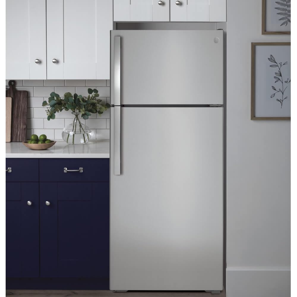 GE GTE18GTNRWW 28" Energy Star Qualified Top Freezer Refrigerator with 17.52 cu. ft. Capacity LED Lighting Adjustable Glass Shelves and Upfront Temperature Controls in White