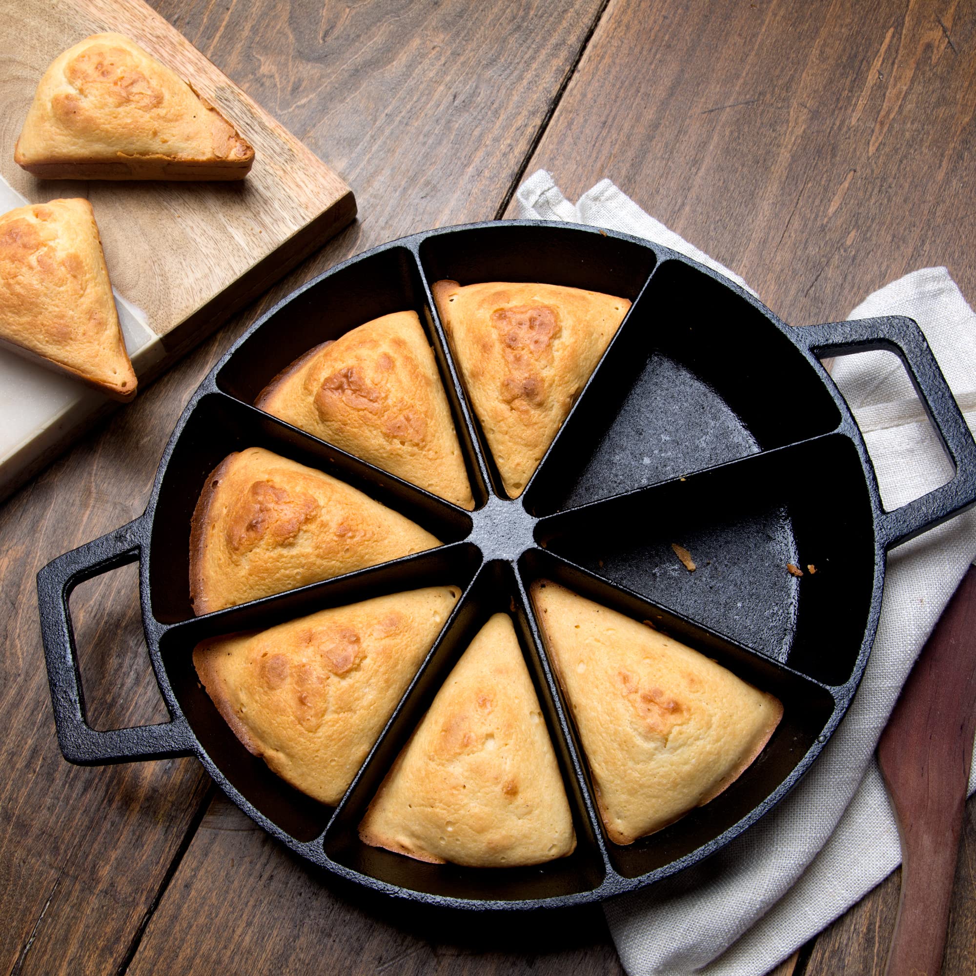 Bayou Classic 10-in Cast Iron Wedge Cornbread Skillet Features Side Loop Handles For Easy Transport Bakes 8 Wedges of Cornbread