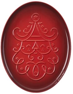 le creuset stoneware noel collection: oval santa cookie platter, 14 oz., cerise w/embossed design