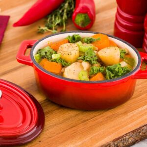 Restaurantware 9 Ounce Mini Casserole Dish 1 Mini Dutch Oven With Lid - Enameled Oval Red Cast Iron Mini Cocotte Heavy-Duty For Baking Braising or Roasting