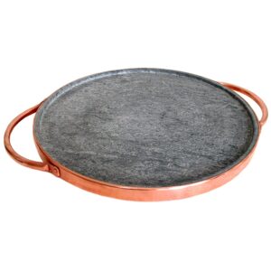 cookstone 12" soapstone pizza stone with copper handles | handcrafted from a slab of pure soapstone | unique, durable and eco-friendly | non-toxic and non-stick