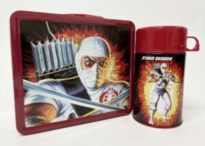 g.i. joe: storm shadow and snake eyes tin titans previews exclusive lunchbox