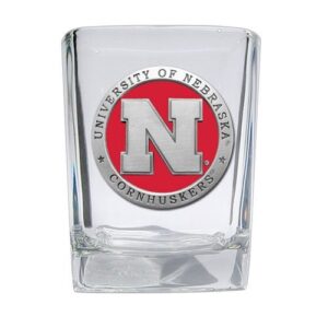 heritage pewter nebraska square shot glass | hand-sculpted 1.5 ounce shot glass | intricately crafted metal pewter alma mater inlay