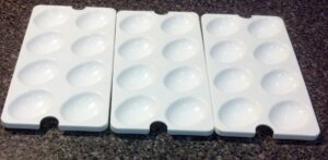 tupperware deviled egg trays or inserts for deli keeper