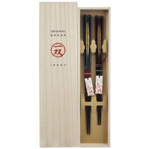 isso husband and wife both using japanese chopsticks set designed with dream drops boxed in paulownia wood.