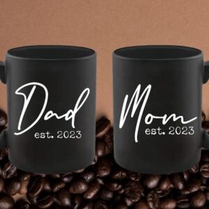 Pregnancy Gift Est 2023 - New Mommy and Daddy Est 2023 11 oz Black Mug Set with "And So The Adventure Begin" Romper (0-3 Months) - Top Mom and Dad Gift Set for New and Expecting Parents to Be