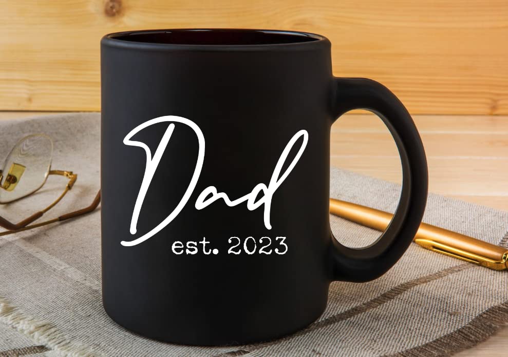 Pregnancy Gift Est 2023 - New Mommy and Daddy Est 2023 11 oz Black Mug Set with "And So The Adventure Begin" Romper (0-3 Months) - Top Mom and Dad Gift Set for New and Expecting Parents to Be